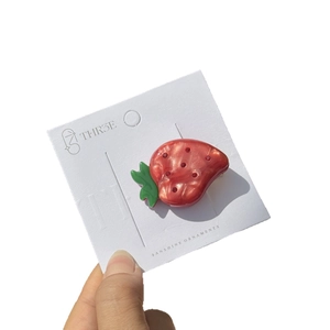Cute red strawberry acetate hair clip with sparkling rhinestones and pearl finish