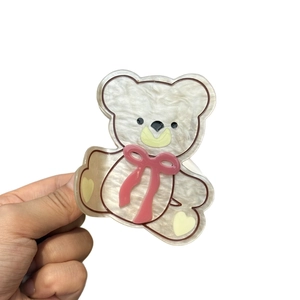 Pince à cheveux ours mignonne en acétate avec nœud rose et détails de cœur pour femmes