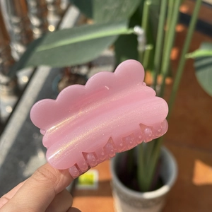 Pink glitter cloud-shaped hair claw clip with pearlescent finish for sweet styling