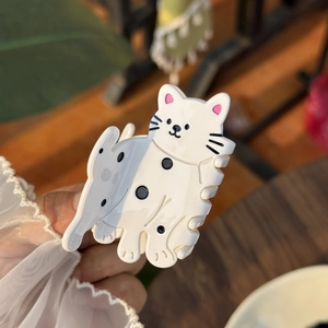 Pince à cheveux en acétate motif chat blanc avec pois noirs et détails d'oreilles roses