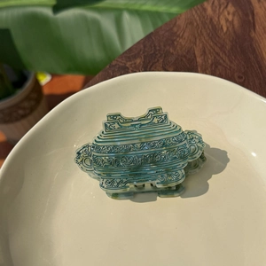 Elegant emerald green acetate hair claw clip with antique Chinese bronze pattern design