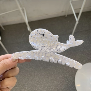 Elegant whale-shaped acetate hair claw clip with white translucent stone patterns for women