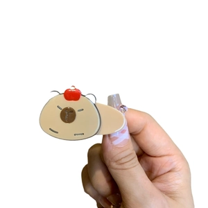 Cute Capybara duck hair clip featuring a cream cartoon bear with a red cherry accent