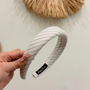 Minimalist wide striped headband in white and black fabric with high crown design