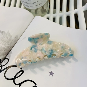 Blue and pink marble acetate hair claw clip with marshmallow color aesthetic for women