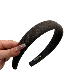 Wide padded striped headband in dark coffee brown with vintage high-top design