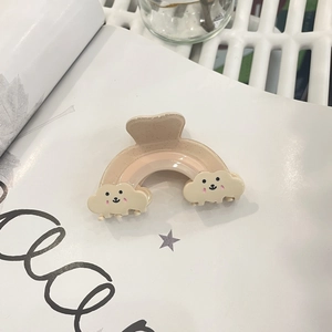 Sweet rainbow hair claw clip with cute cloud faces in creamy beige and soft pink colors