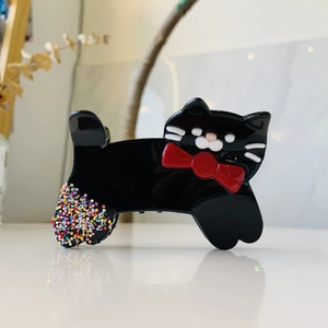 Cute black cat acetate hair claw clip with red bow and colorful glitter stone details