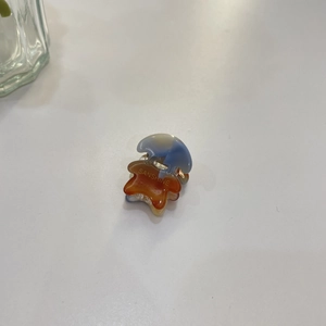 Acetate mushroom mini hair claw clip with blue marble pattern and SANSHINE text logo