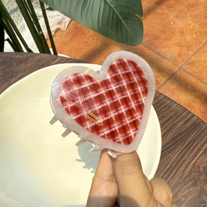 Elegant red and white checkered heart hair claw clip with golden handmade logo detail
