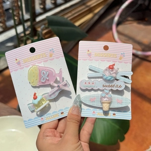 Cute dessert-themed hair clip set with ice cream and sweet treats on display card