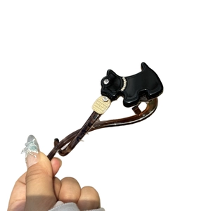 Elegant acetate Scottish Terrier hair claw clip with rhinestones and tortoiseshell base