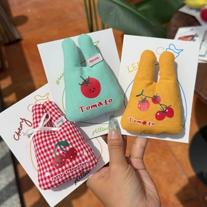 Three-piece set of cute fruit pattern rabbit ear cloth clips in mint, yellow, and plaid