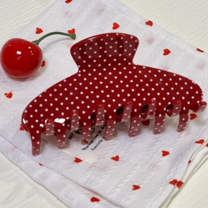Polka dot hair claw clip in red and white acetate for high ponytail hair styling