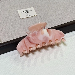 Pink and white marble texture cellulose acetate hair claw clip with large nebula pattern
