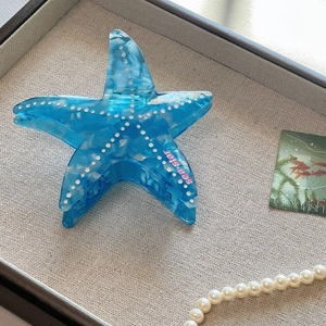 Pinza per capelli a forma di stella marina blu in acetato con design oceano