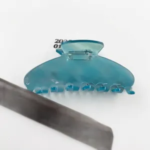 Pince à cheveux élégante en acétate bleu translucide avec rayures pour femmes et filles
