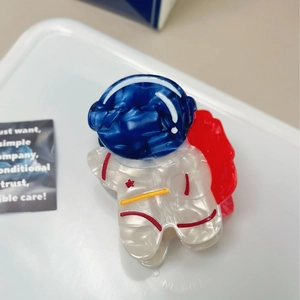Pince à cheveux astronaute mignonne en acétate avec motif marbré et détails d'étoile
