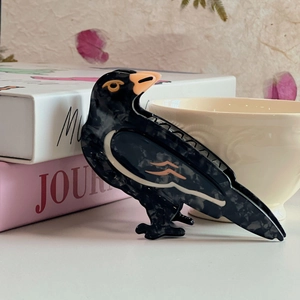 Eleganter Haarklammer aus Acetat in Vogelform mit schwarzer Marmortextur für Damenfrisuren