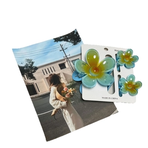 Jelly flower petal gradient hair clips set in light blue and yellow on display card
