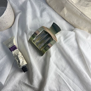Matte rectangle hair claw clip with marble texture for thick hair on white fabric