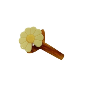 Sweet yellow daisy hair claw clip with amber tortoiseshell finish for versatile daily styling