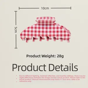 Detailed view of a 10cm red gingham hair claw clip with specific size measurements