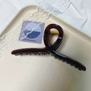 Elegant 12.5cm large hair claw clip with dark tortoiseshell pattern and gold spring
