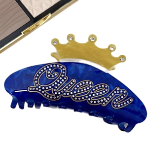 Blue marble texture crown hair claw clip with Queen rhinestone inlay and yellow accents