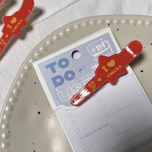 Patriotic red heart hair clip featuring I Love China text and yellow stars for kids