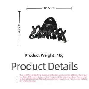 Detailed view showing dimensions of a glossy black hollow hair claw clip, 10.5cm length