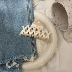 Elegant pearlescent white phoenix texture hair claw clip with cutout lattice design