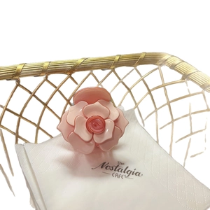 French vintage style pink rose hair claw clip with elegant resin camellia design