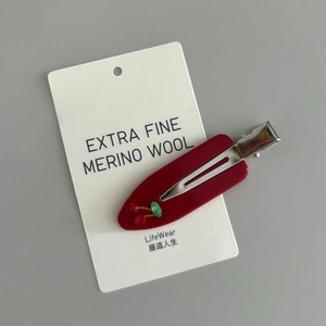 French style red cherry acetate hair clip with rhinestones on a white display card