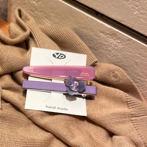Elegant floral bow hair clip set with pink acrylic barrette and purple satin flower