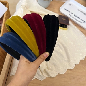 Padded velvet headband set in four retro colors for a stylish high skull top look