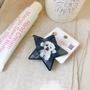 Star-shaped phone grip featuring a cute white puppy design and glossy epoxy finish