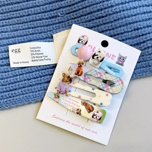 Sweet pet-themed hair clip set featuring cats and dogs on a blue knitted background