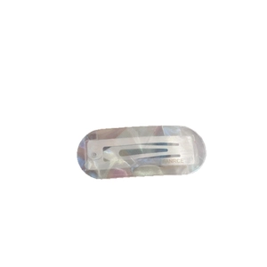 Colorful acetate marble hair clip with gold logo in soft pastel macaron tones