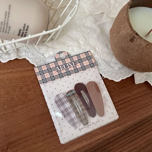 4-piece hair clip set with plaid fabric and matte finish styles in warm brown tones