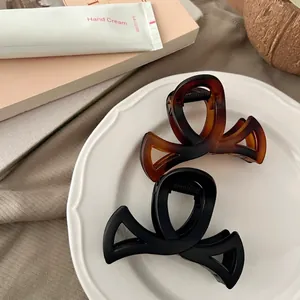 Lot de pinces à cheveux noir mat et écaille de tortue ambrée avec nœud évidé de 8,5 cm