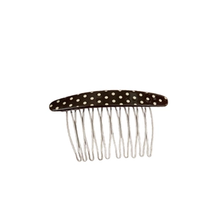 Vintage black polka dot acetate hair comb with ten silver metal teeth for elegant styling