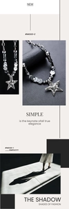 Detailed macro view of the pentagram pendant and v-shaped beads on the steel necklace