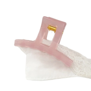 Minimalist pink translucent acrylic hair claw clip with a strong golden metal spring