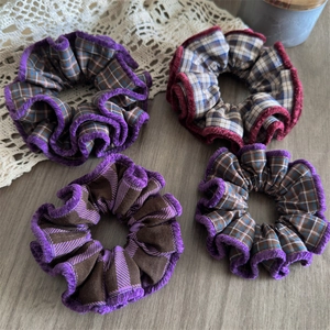 Set of four handmade plaid scrunchies with plush edges in purple and red autumn colors