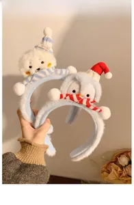 Détails de l'ensemble de bandeaux en peluche avec ourson blanc et pingouin bleu