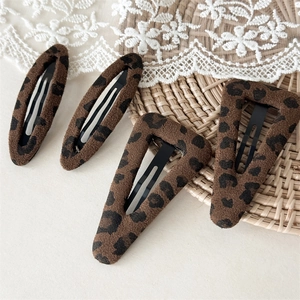 Leopard print plush hair clips set in oval and triangle shapes for autumn winter style