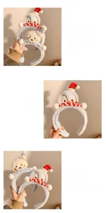 Détail de bandeaux en peluche pingouin et chiot avec écharpes et chapeaux de fête