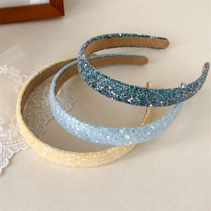 Three-piece sequin headband set in grey, blue, and yellow with soft suede inner lining