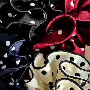 Vintage red and black polka dot large hair scrunchies with soft chiffon fabric textures